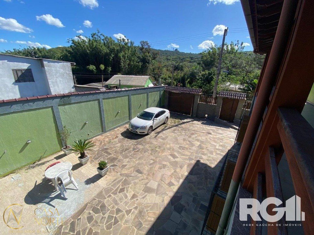 Casa à venda com 4 quartos, 269m², 1 suíte, 3 vagas, Rua Ventura Pinto no bairro Belém Velho em Porto Alegre