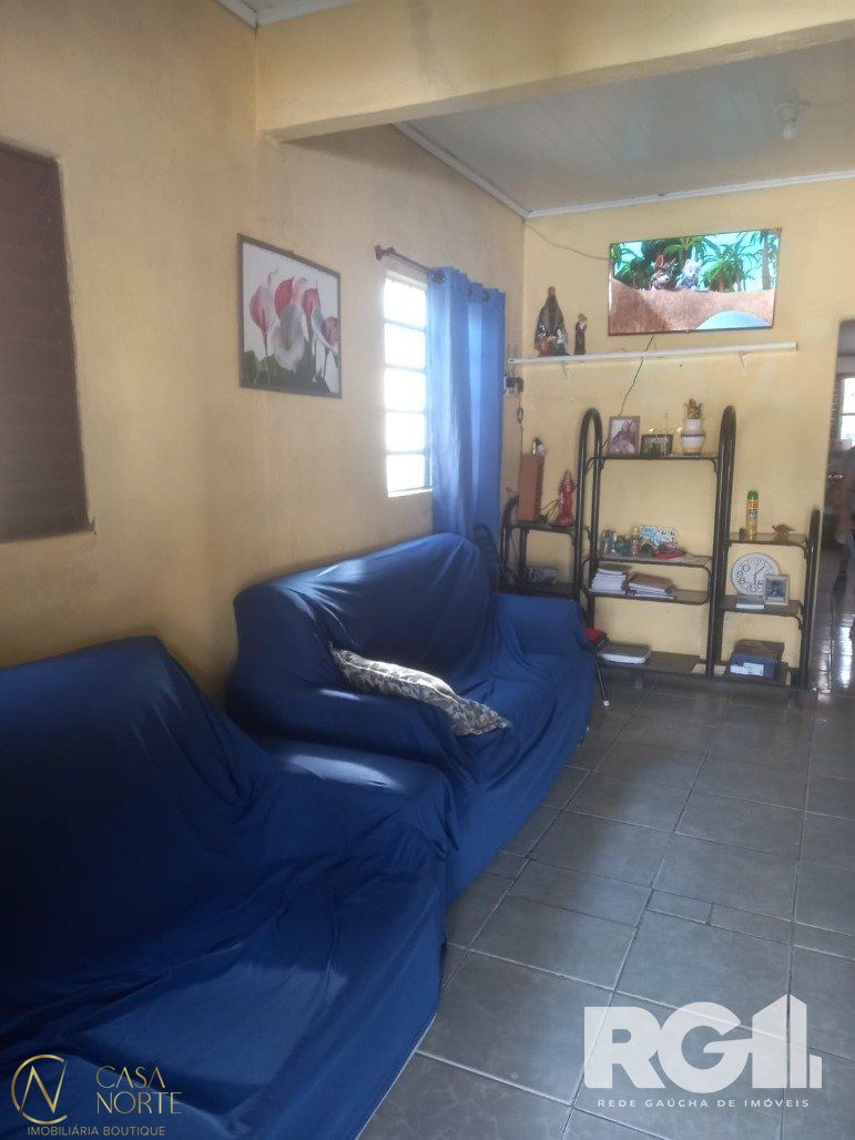 Casa à venda com 3 quartos, 108m², 2 vagas, Rua Primavera do Varejão no bairro Lami em Porto Alegre