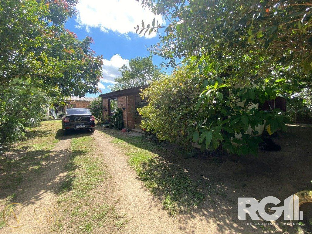 Casa à venda com 3 quartos, 138m², Rua Oito Mil e Quatorze no bairro Lageado em Porto Alegre