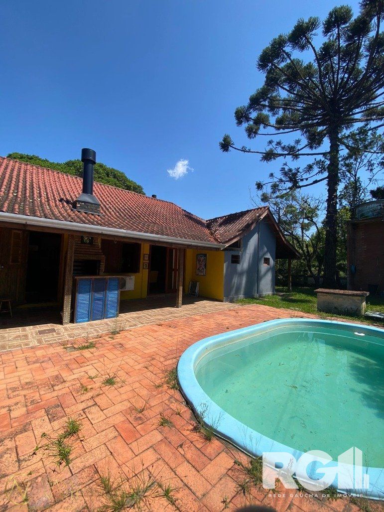 Sítio à venda , 6000m², 2 suítes, 3 vagas, Rua Flavio Garrafielo no bairro São Caetano em Porto Alegre