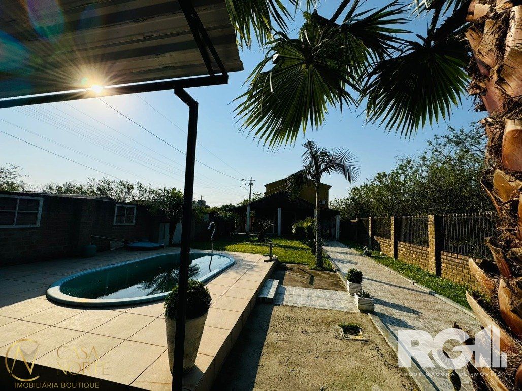 Casa à venda com 3 quartos, 136m², 1 suíte, 3 vagas, Estrada Otaviano José Pinto no bairro Lami em Porto Alegre