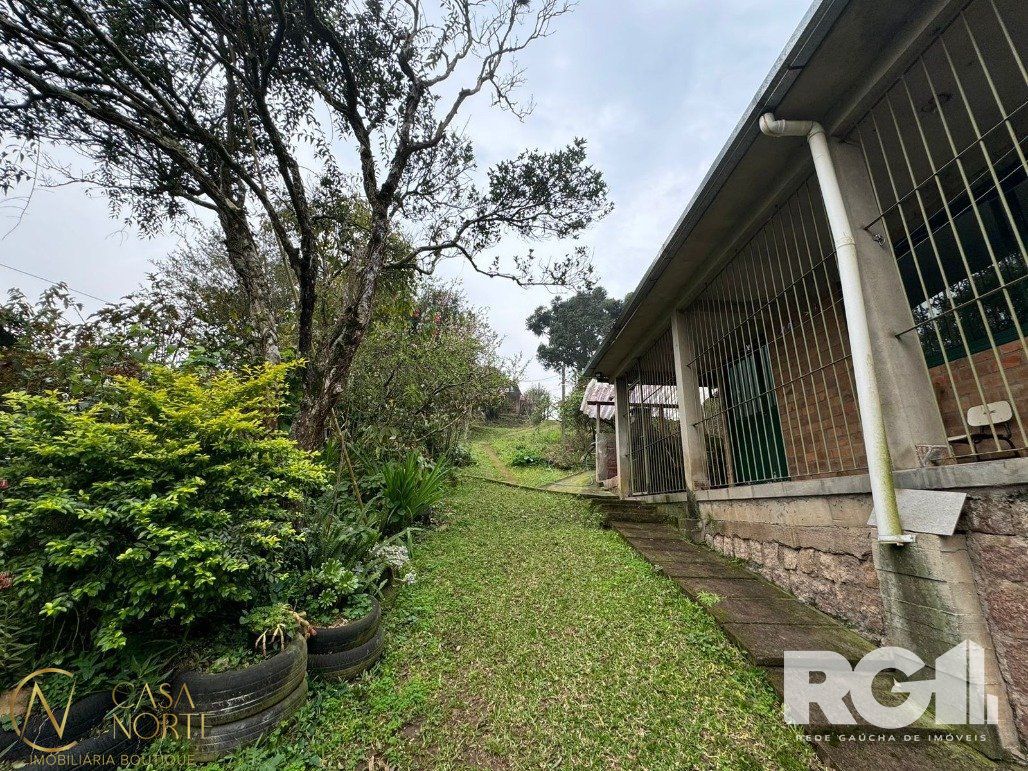 Casa à venda com 3 quartos, 90m², 1 suíte, Rua dos Canudos no bairro Cascata em Porto Alegre