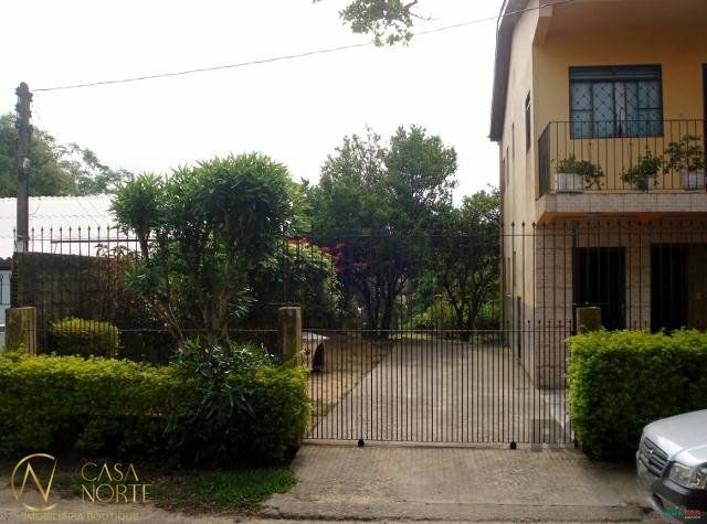 Casa à venda com 5 quartos, 1162m², 3 vagas, Rua Laranjeiras no bairro Restinga em Porto Alegre