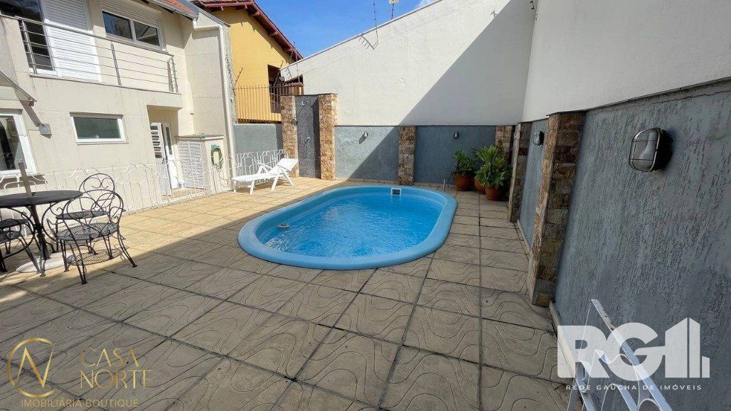 Casa à venda com 4 quartos, 411m², 2 suítes, 4 vagas, Rua Parque dos Nativos no bairro Vila Ipiranga em Porto Alegre