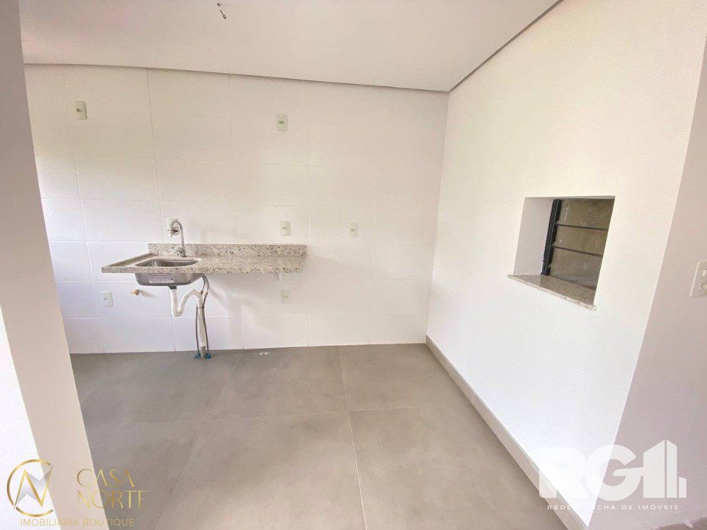 Apartamento à venda com 2 quartos, 67m², 1 suíte, 1 vaga, Praça Doutor Gastão Santos no bairro Passo da Areia em Porto Alegre