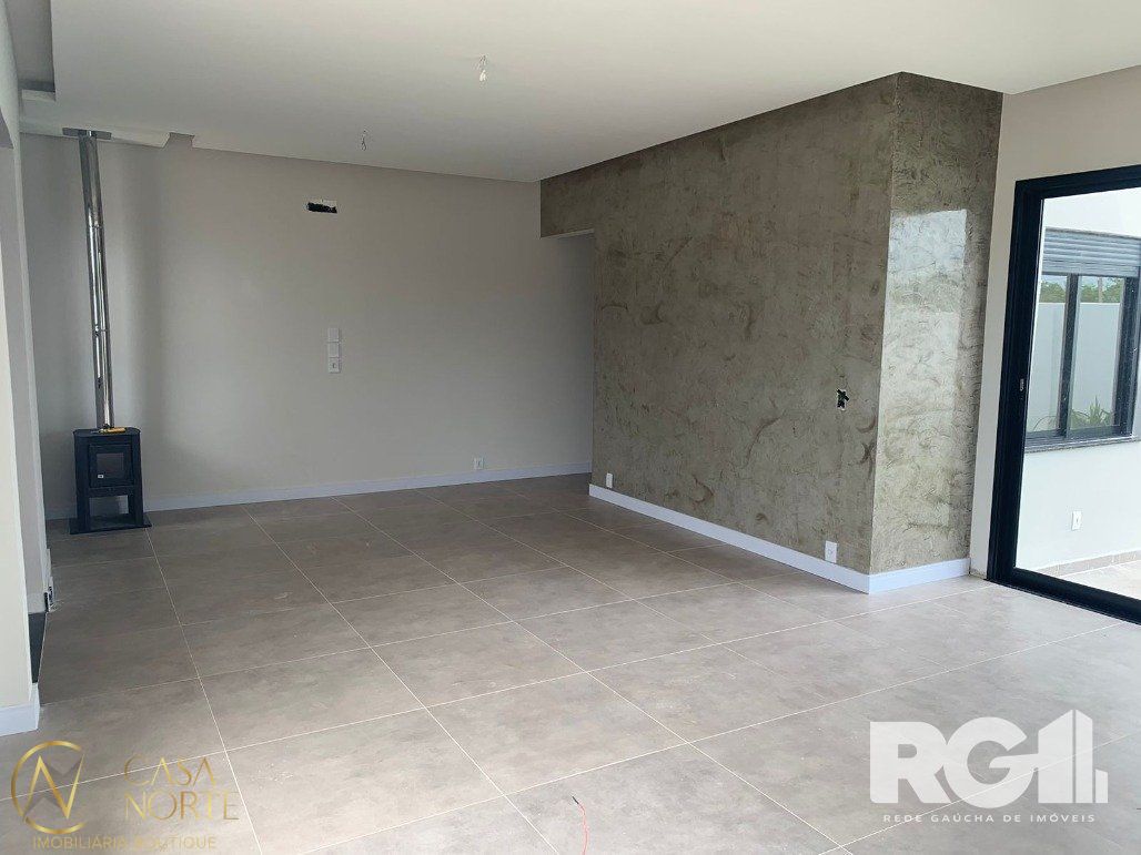 Casa de Condomínio à venda com 3 quartos, 137m², 3 suítes, 2 vagas, Rua Elisabeth Dri no bairro Mário Quintana em Porto Alegre