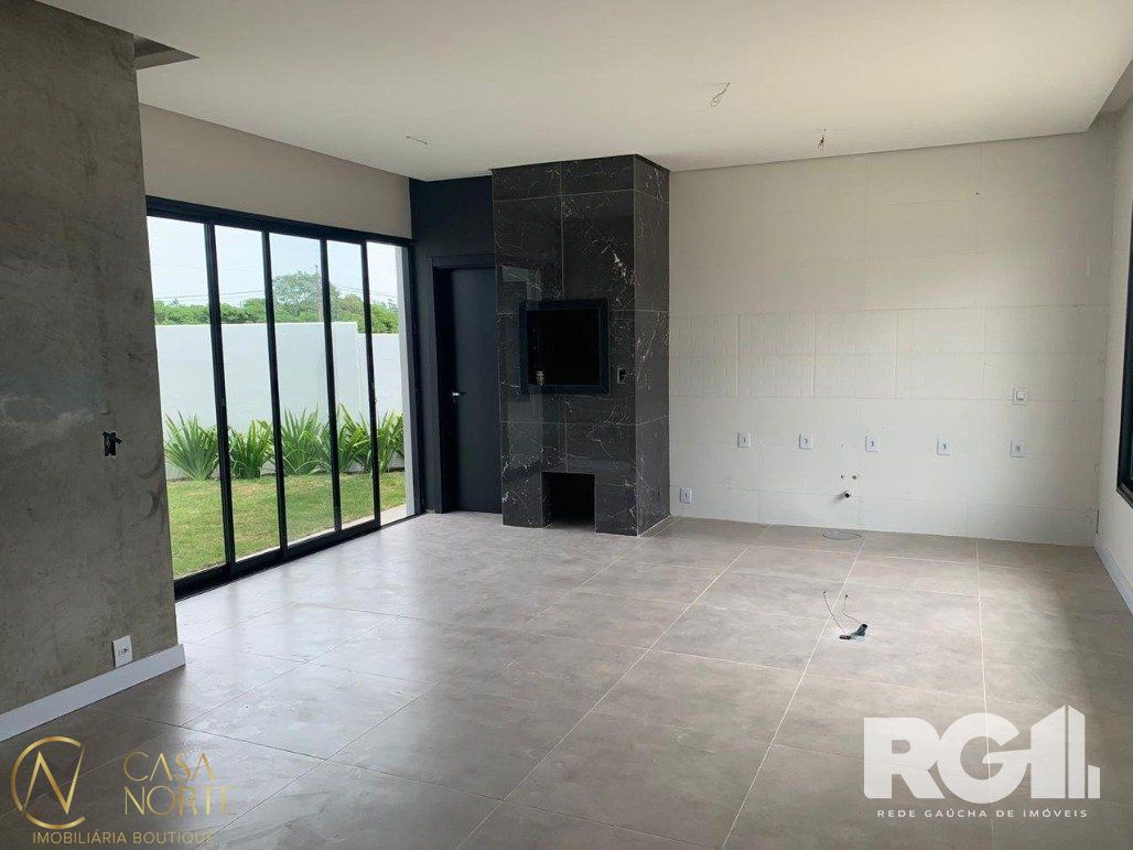 Casa de Condomínio à venda com 3 quartos, 137m², 3 suítes, 2 vagas, Rua Elisabeth Dri no bairro Mário Quintana em Porto Alegre