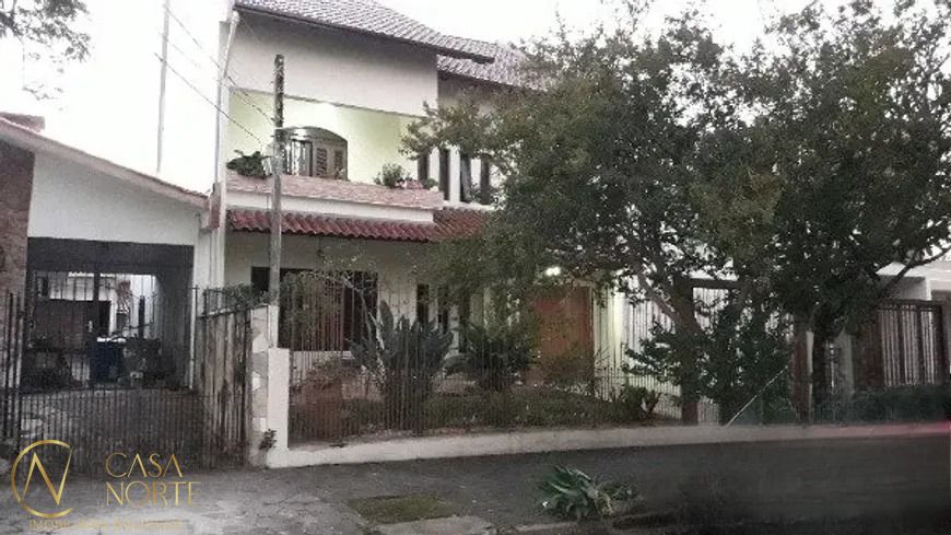 Casa à venda com 4 quartos, 364m², 1 suíte, 3 vagas, Rua Doutor José Éboli no bairro Jardim Itu em Porto Alegre