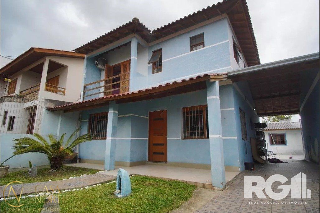 Casa à venda com 3 quartos, 280m², 1 suíte, 3 vagas, Rua Paulo Madureira Coelho no bairro Morro Santana em Porto Alegre