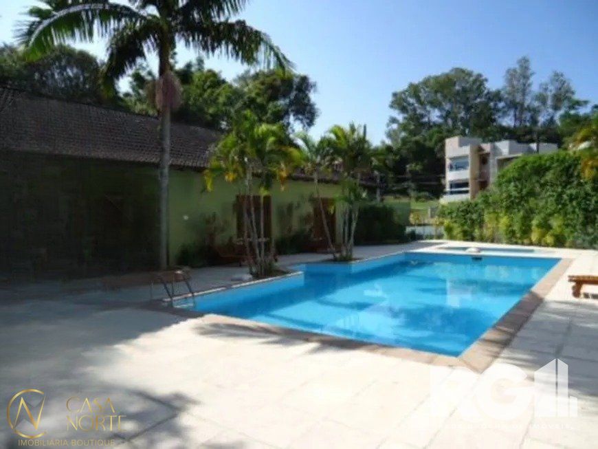 Casa de Condomínio à venda com 4 quartos, 440m², 2 vagas, Rua Tocantins no bairro Lomba do Pinheiro em Porto Alegre