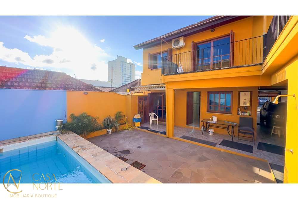 Casa à venda com 4 quartos, 307m², 1 suíte, 3 vagas, Coronel Jaime da Costa Pereira no bairro Partenon em Porto Alegre
