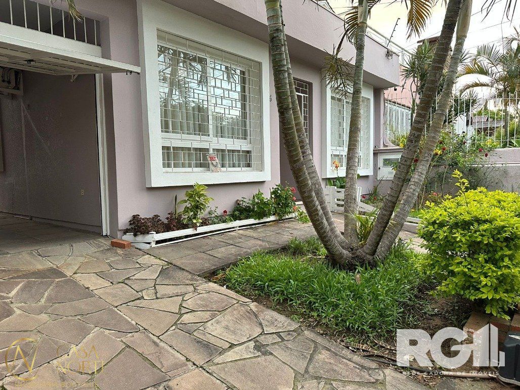 Casa à venda com 3 quartos, 165m², 1 suíte, 2 vagas, Avenida Rachel Wolfrid no bairro Morro Santana em Porto Alegre