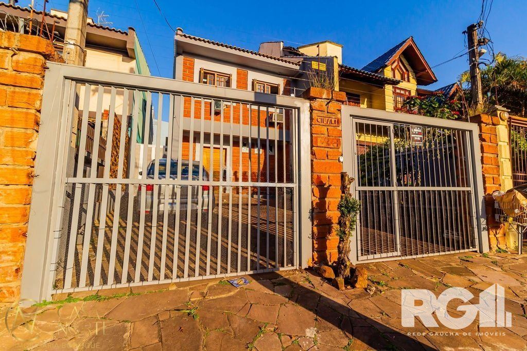 Casa à venda com 3 quartos, 165m², 1 suíte, 2 vagas, Rua Luiz Fontoura Júnior no bairro Jardim Planalto em Porto Alegre
