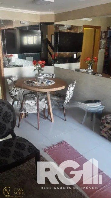 Casa à venda com 3 quartos, 90m², 1 suíte, 2 vagas, Rua Carlos de Britto Velho no bairro Parque Santa Fé em Porto Alegre