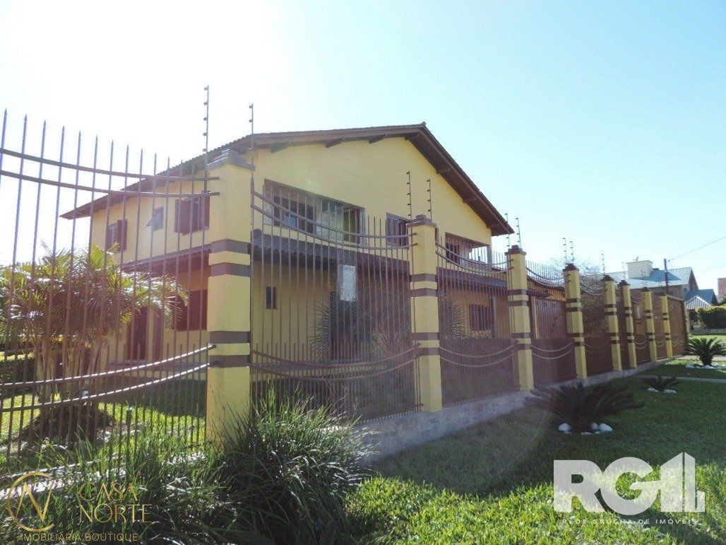 Casa à venda com 4 quartos, 530m², 3 suítes, 3 vagas, Rua Maria Elaine Wotter no bairro Parque Santa Fé em Porto Alegre