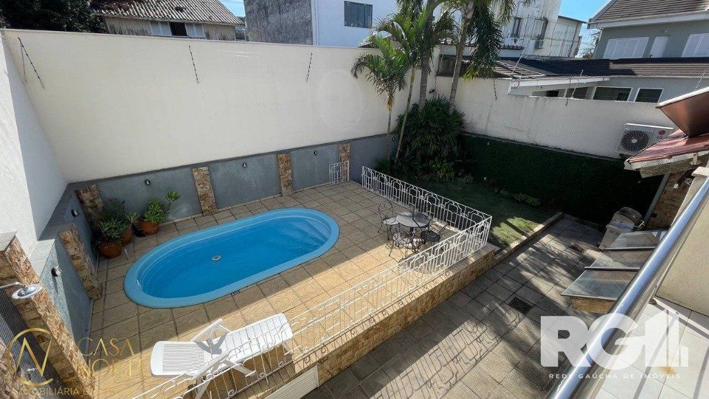 Casa à venda com 4 quartos, 411m², 2 suítes, 4 vagas, Rua Parque dos Nativos no bairro Vila Ipiranga em Porto Alegre