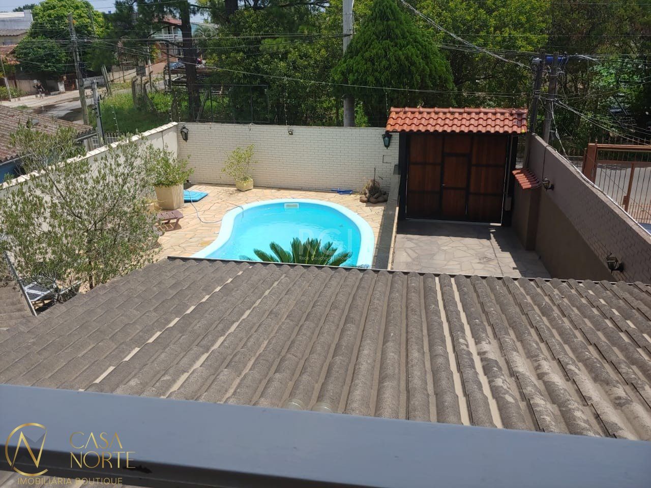 Casa à venda com 3 quartos, 250m², 1 suíte, 5 vagas, Rua João Paris no bairro Santa Rosa de Lima em Porto Alegre