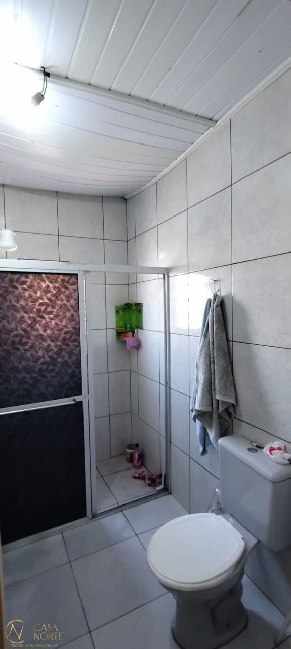 Casa à venda com 5 quartos, 100m², 1 vaga, Rua Sete Mil e Quatro no bairro Restinga em Porto Alegre