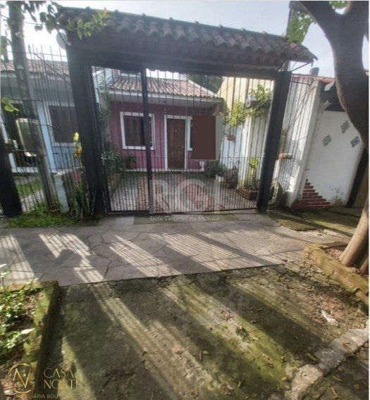 Casa à venda com 2 quartos, 63m², 2 vagas, Rua Elmo Born no bairro Hípica em Porto Alegre