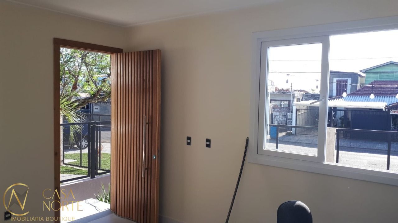 Casa à venda com 3 quartos, 69m², 1 suíte, 2 vagas, Rua Criciúma no bairro Guarujá em Porto Alegre