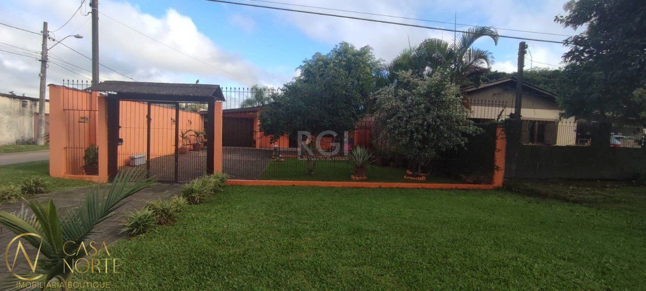 Casa à venda com 3 quartos, 120m², 3 vagas, Rua Santa Mônica no bairro Ponta Grossa em Porto Alegre