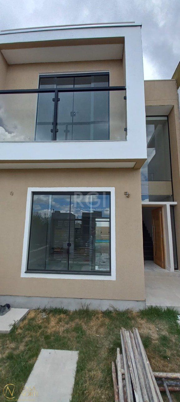 Casa à venda com 3 quartos, 100m², 3 suítes, 2 vagas, Rua Werno Finkler no bairro Aberta dos Morros em Porto Alegre