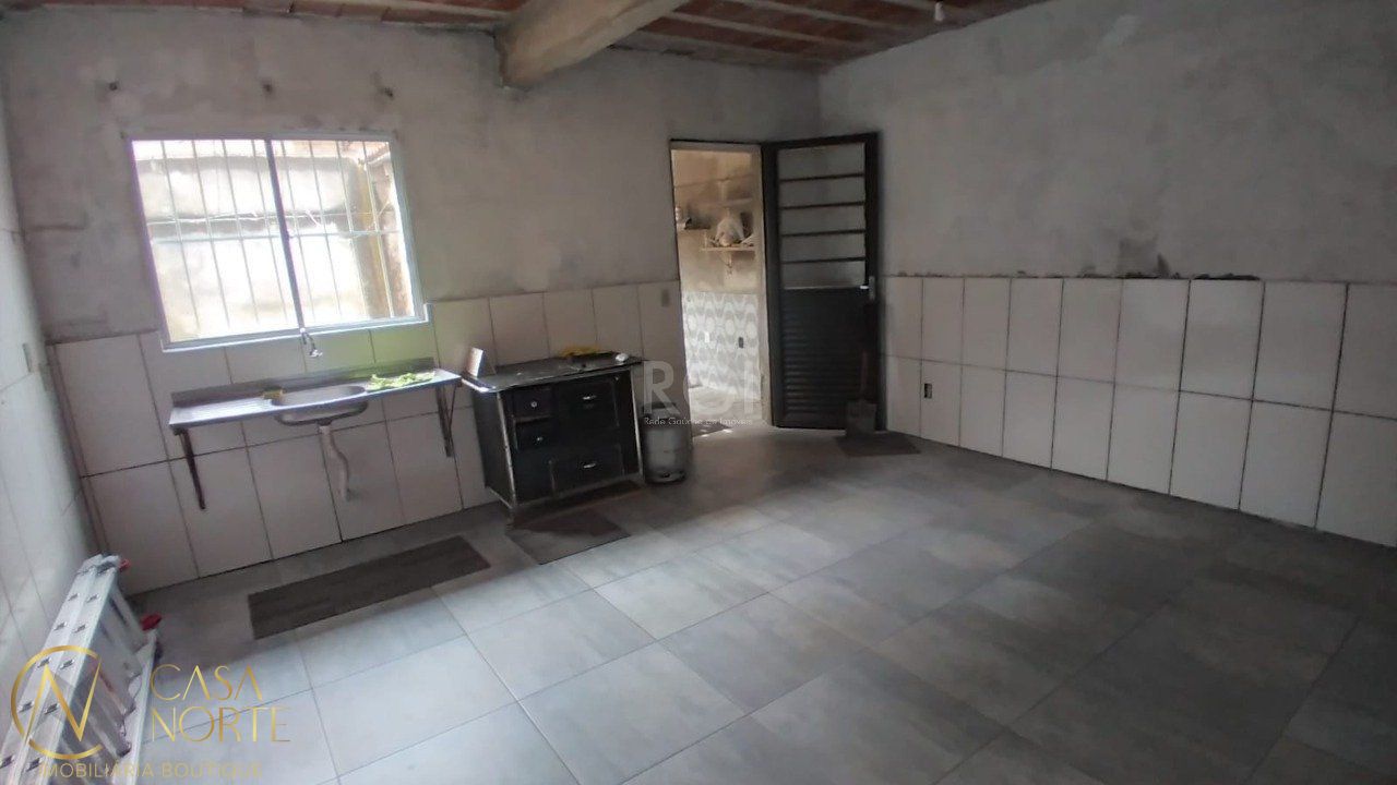Sobrado à venda com 4 quartos, 150m², 1 vaga, Rua Doutor Antônio Mazzaferro Neto no bairro Hípica em Porto Alegre