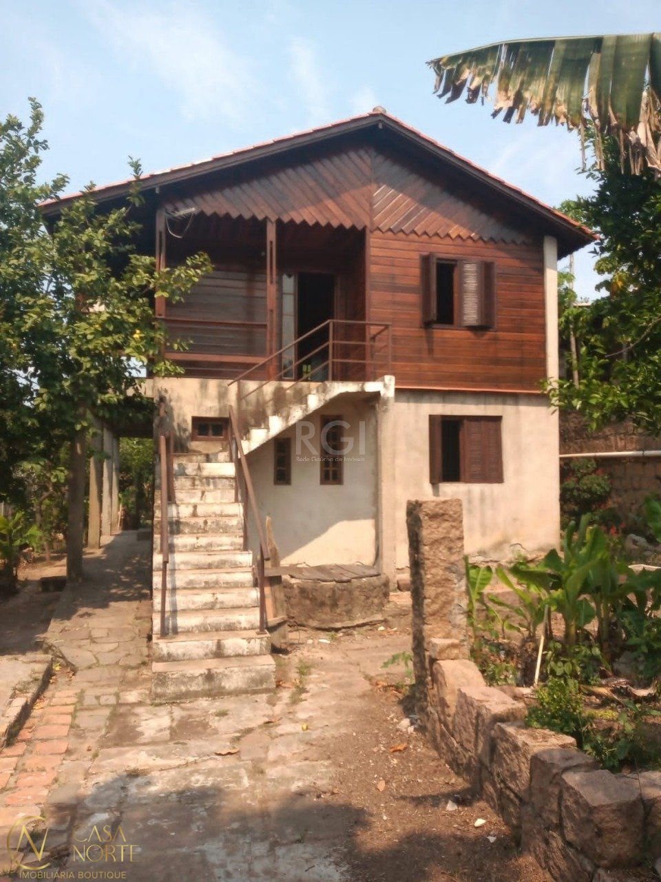 Casa à venda com 4 quartos, 150m², 2 vagas, Rua Marquês do Maricá no bairro Vila Nova em Porto Alegre