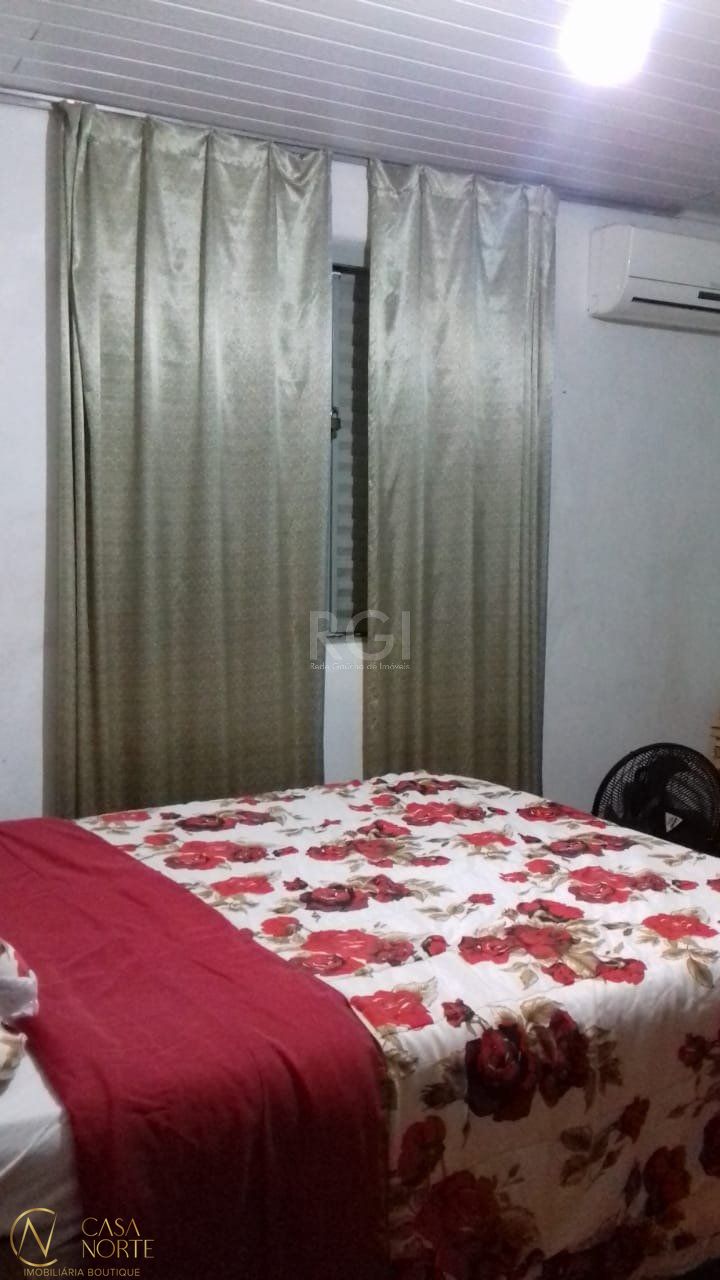 Casa à venda com 4 quartos, 160m², 1 suíte, 4 vagas, Beco dos Rossatos no bairro Campo Novo em Porto Alegre