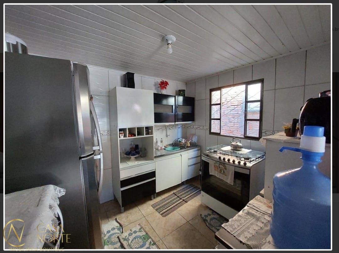 Casa à venda com 2 quartos, 63m², 1 vaga, Rua Mário Vieira Marques no bairro Hípica em Porto Alegre
