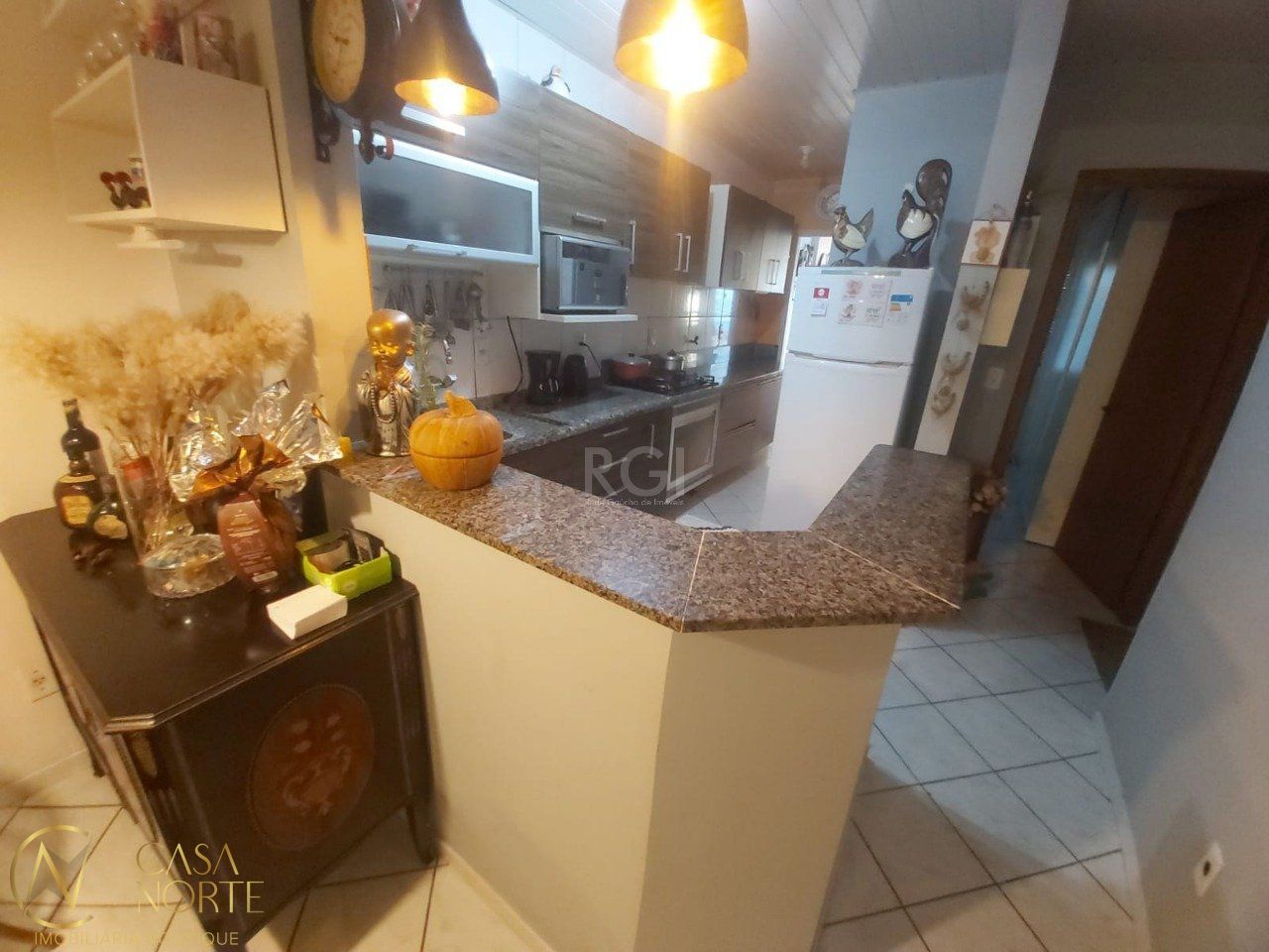 Casa à venda com 3 quartos, 60m², 2 vagas, Rua Irmão Firmino Biazus no bairro Hípica em Porto Alegre