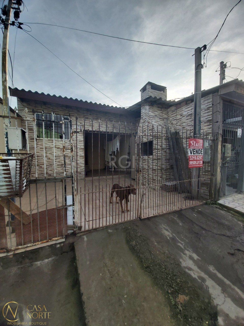 Casa à venda com 2 quartos, 100m², 2 vagas, Rua Germano Bonow Filho no bairro Hípica em Porto Alegre