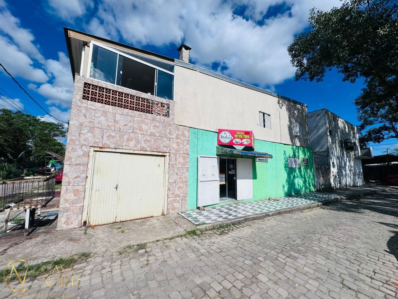 Casa à venda com 3 quartos, 260m², 1 suíte, 1 vaga, Acesso Rua Dois no bairro Restinga em Porto Alegre