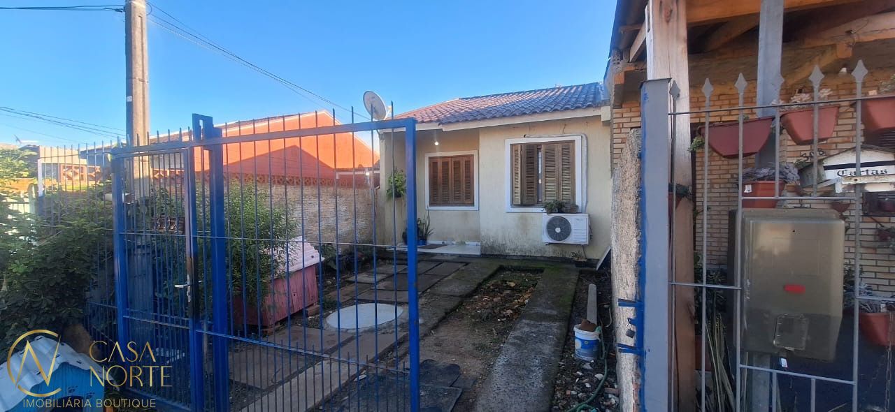 Casa à venda com 2 quartos, 50m², 1 vaga, Rua Carlos Wilson Schröder no bairro Hípica em Porto Alegre