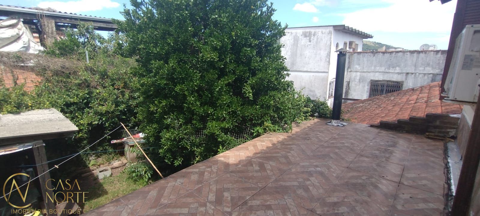 Casa à venda com 4 quartos, 120m², 1 suíte, 2 vagas, Rua Jóia no bairro Vila Nova em Porto Alegre