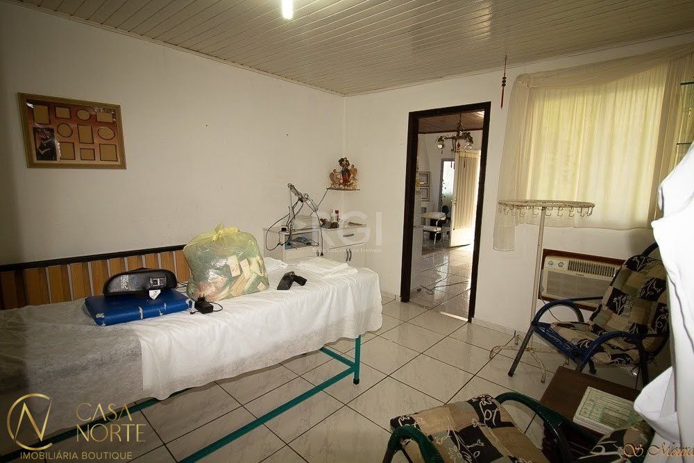 Casa à venda com 3 quartos, 170m², 1 suíte, 1 vaga, Rua Liberal no bairro Tristeza em Porto Alegre