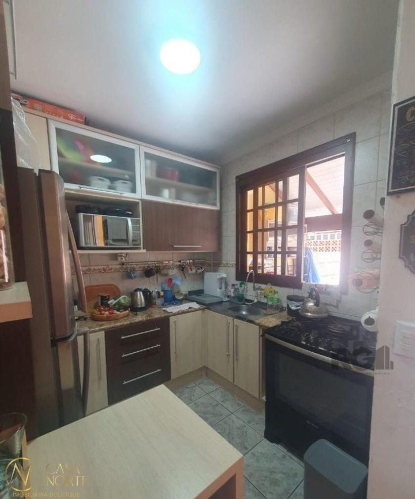 Casa de Condomínio à venda com 3 quartos, 84m², 1 vaga, Avenida Edgar Pires de Castro no bairro Hípica em Porto Alegre