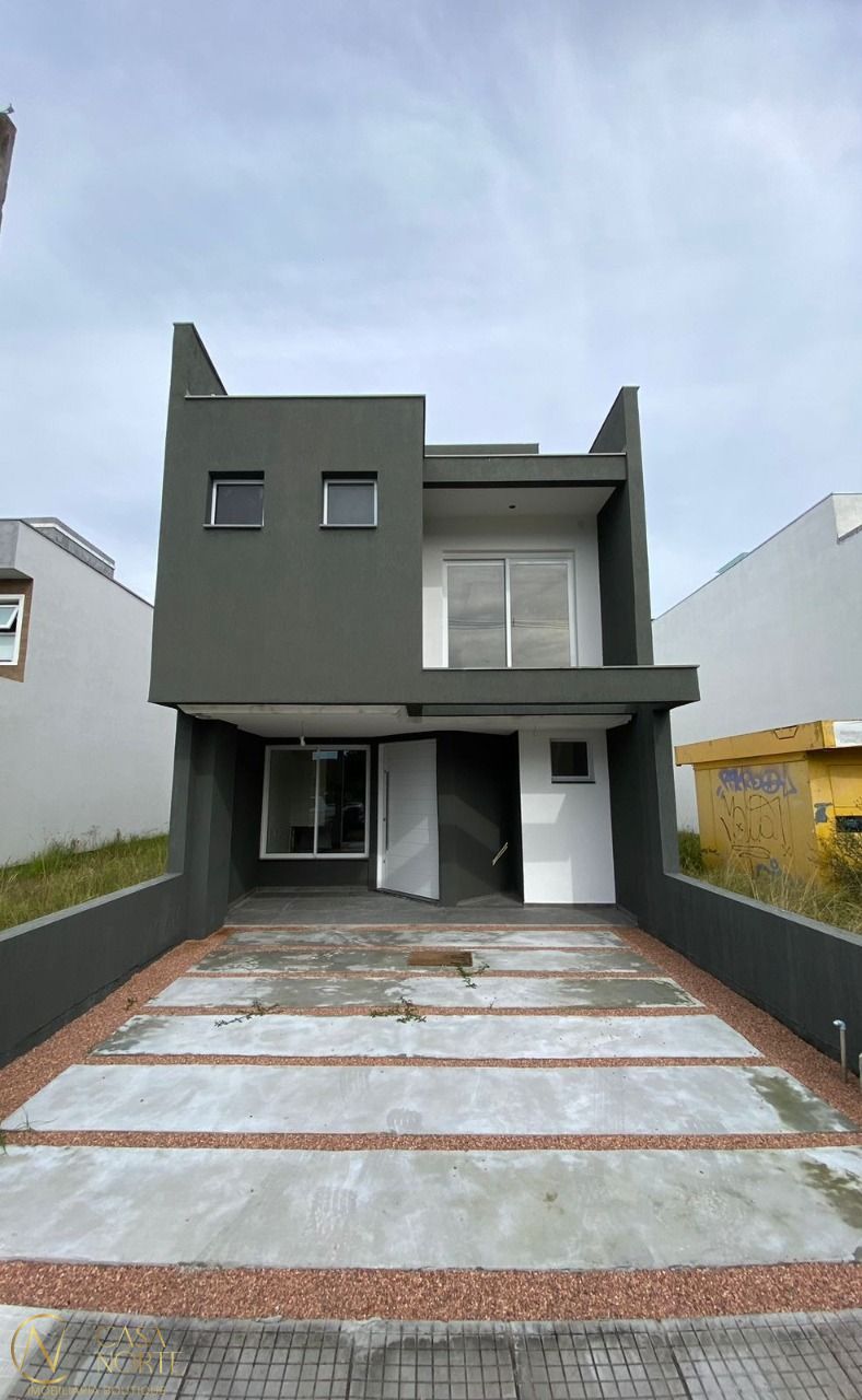 Casa à venda com 3 quartos, 224m², 3 suítes, 2 vagas, Rua Marco Túlio Kalil Ferreyro no bairro Aberta dos Morros em Porto Alegre