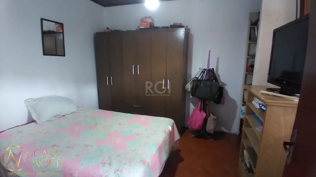 Casa à venda com 3 quartos, 98m², 1 suíte, 3 vagas, Rua Marcírio da Silva Barbosa no bairro Aberta dos Morros em Porto Alegre