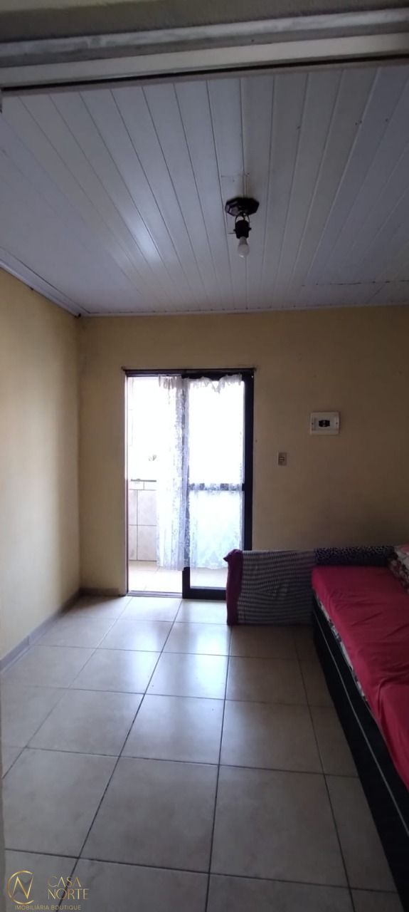 Casa à venda com 5 quartos, 100m², 1 vaga, Rua Sete Mil e Quatro no bairro Restinga em Porto Alegre