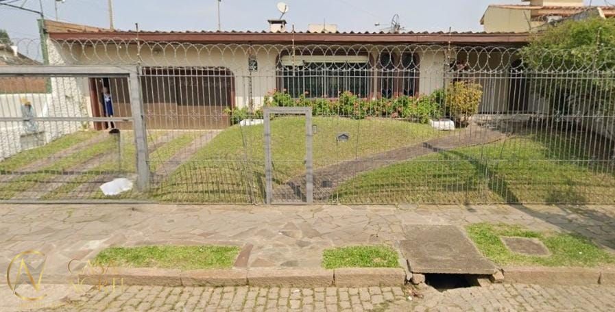 Casa à venda com 4 quartos, 464m², 2 suítes, 2 vagas, Rua Jacipuia no bairro Guarujá em Porto Alegre