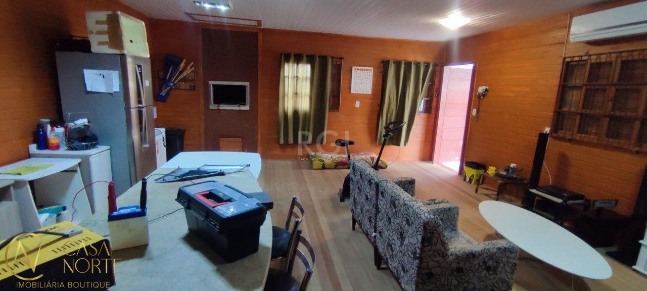 Casa à venda com 2 quartos, 120m², 2 vagas, Rua Ponciano Pacheco da Silveira no bairro Guarujá em Porto Alegre