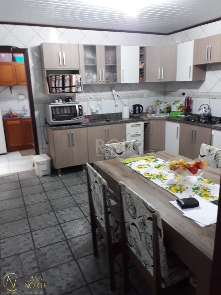 Casa à venda com 3 quartos, 90m², 1 suíte, 2 vagas, Rua Doutor Antônio Mazzaferro Neto no bairro Hípica em Porto Alegre