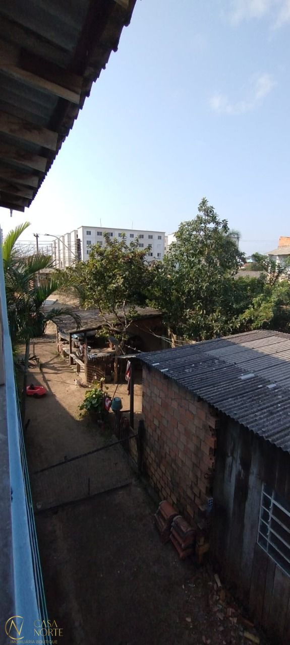 Casa à venda com 5 quartos, 100m², 1 vaga, Rua Sete Mil e Quatro no bairro Restinga em Porto Alegre