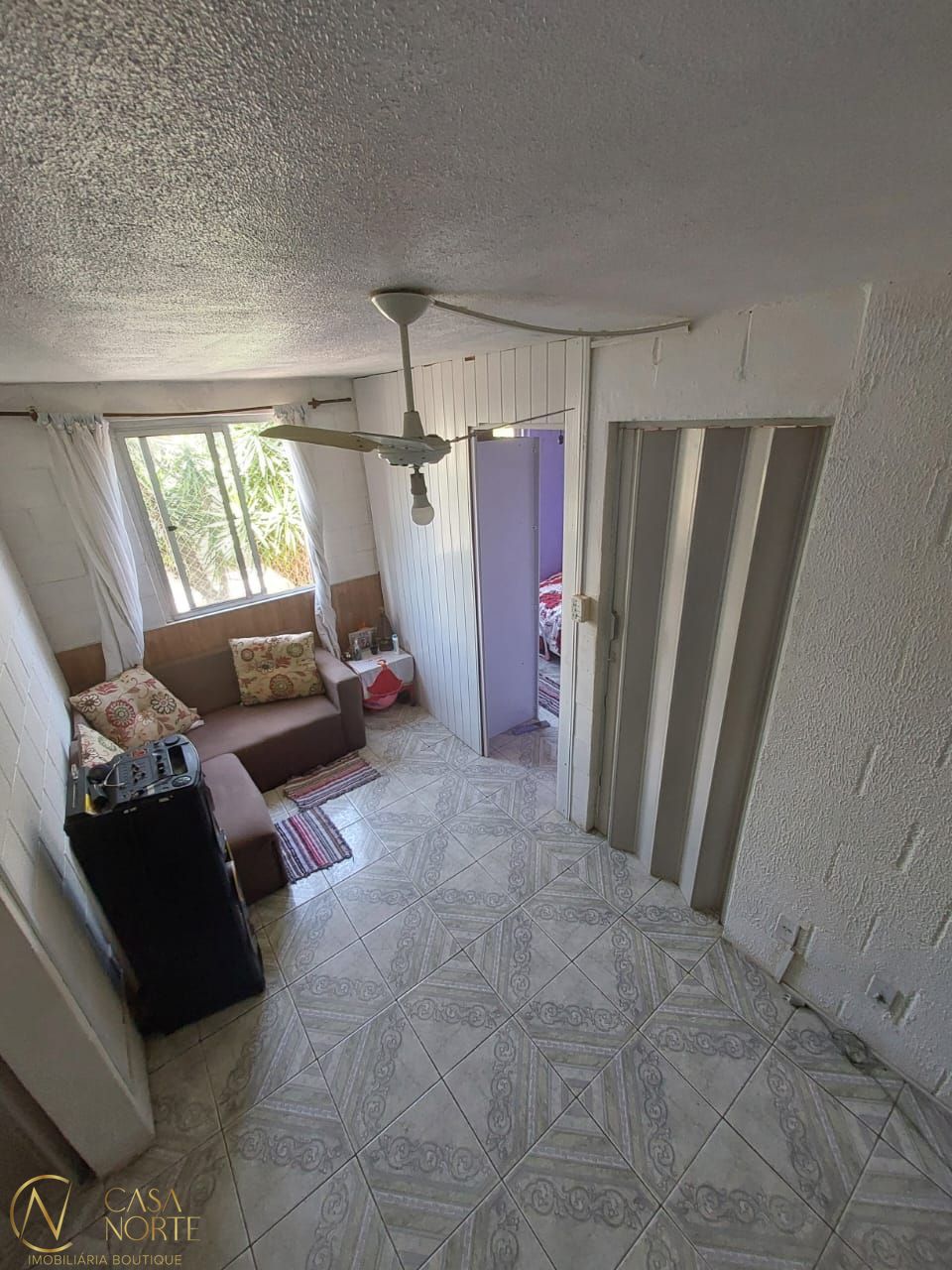 Apartamento à venda com 2 quartos, 36m², 1 vaga, Rua Atílio Supertti no bairro Vila Nova em Porto Alegre