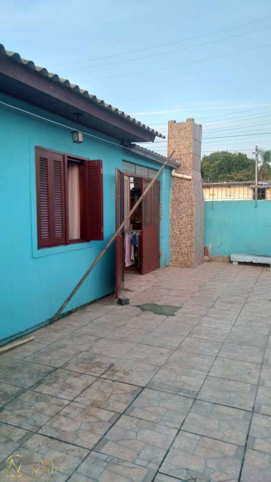 Casa à venda com 3 quartos, 110m², 2 vagas, Acesso Bonar Figueiro no bairro Restinga em Porto Alegre