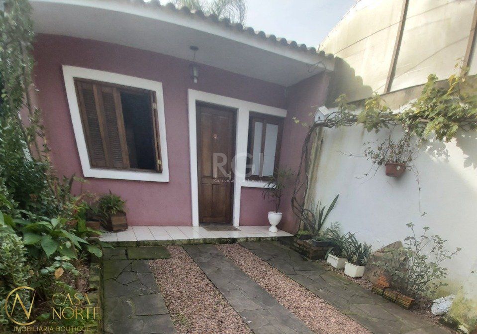 Casa à venda com 2 quartos, 63m², 2 vagas, Rua Elmo Born no bairro Hípica em Porto Alegre
