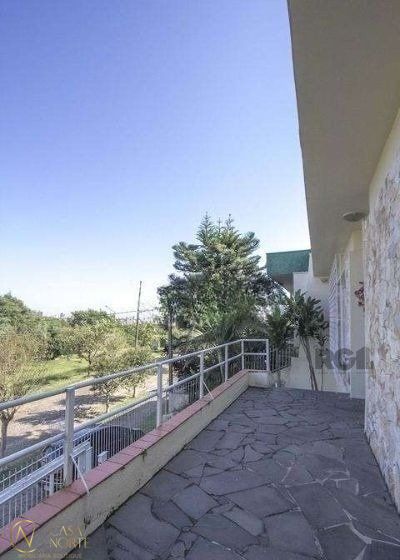 Casa à venda com 3 quartos, 215m², 1 suíte, 2 vagas, Rua Ulisses Cabral, Professor no bairro Chácara das Pedras em Porto Alegre