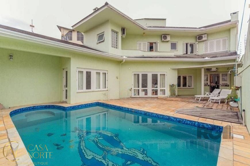 Casa à venda com 4 quartos, 350m², 4 suítes, 2 vagas, Rua Alfredo Miranda Obino no bairro Jardim Itu em Porto Alegre