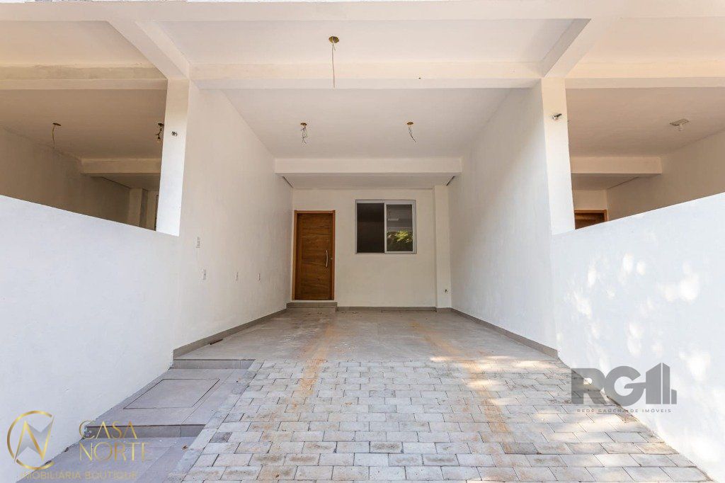 Casa à venda com 3 quartos, 140m², 1 suíte, 2 vagas, Rua Abdo Jorge Curi no bairro Parque Santa Fé em Porto Alegre